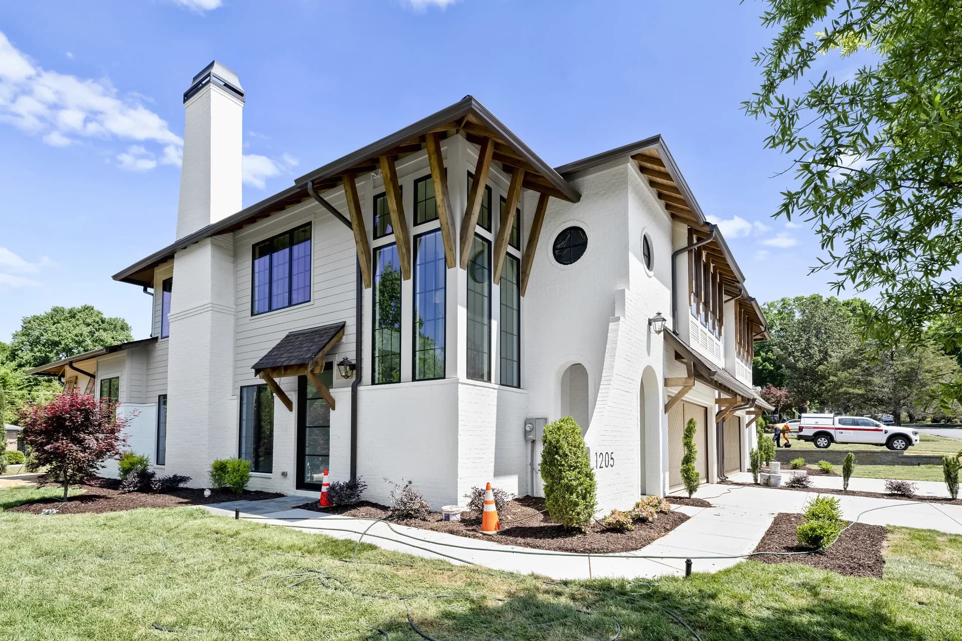 Completed front exterior, entry, and landscaping at 1205 Jersey Ln in Charlotte.